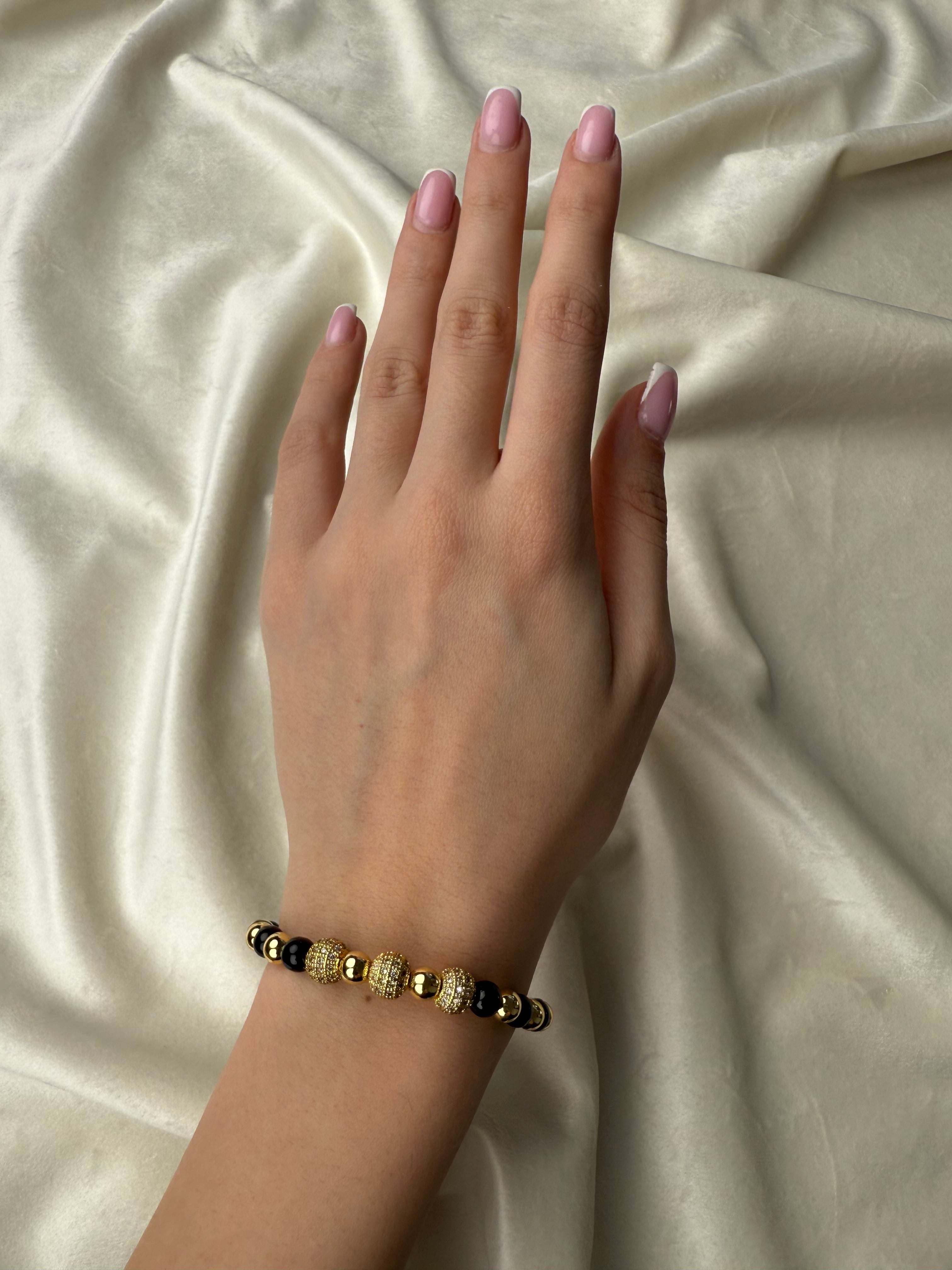 Byzylyk me gure te zinj dhe gold