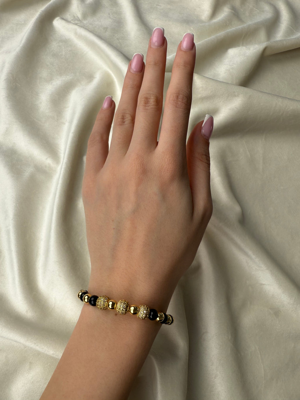 Byzylyk me gure te zinj dhe gold