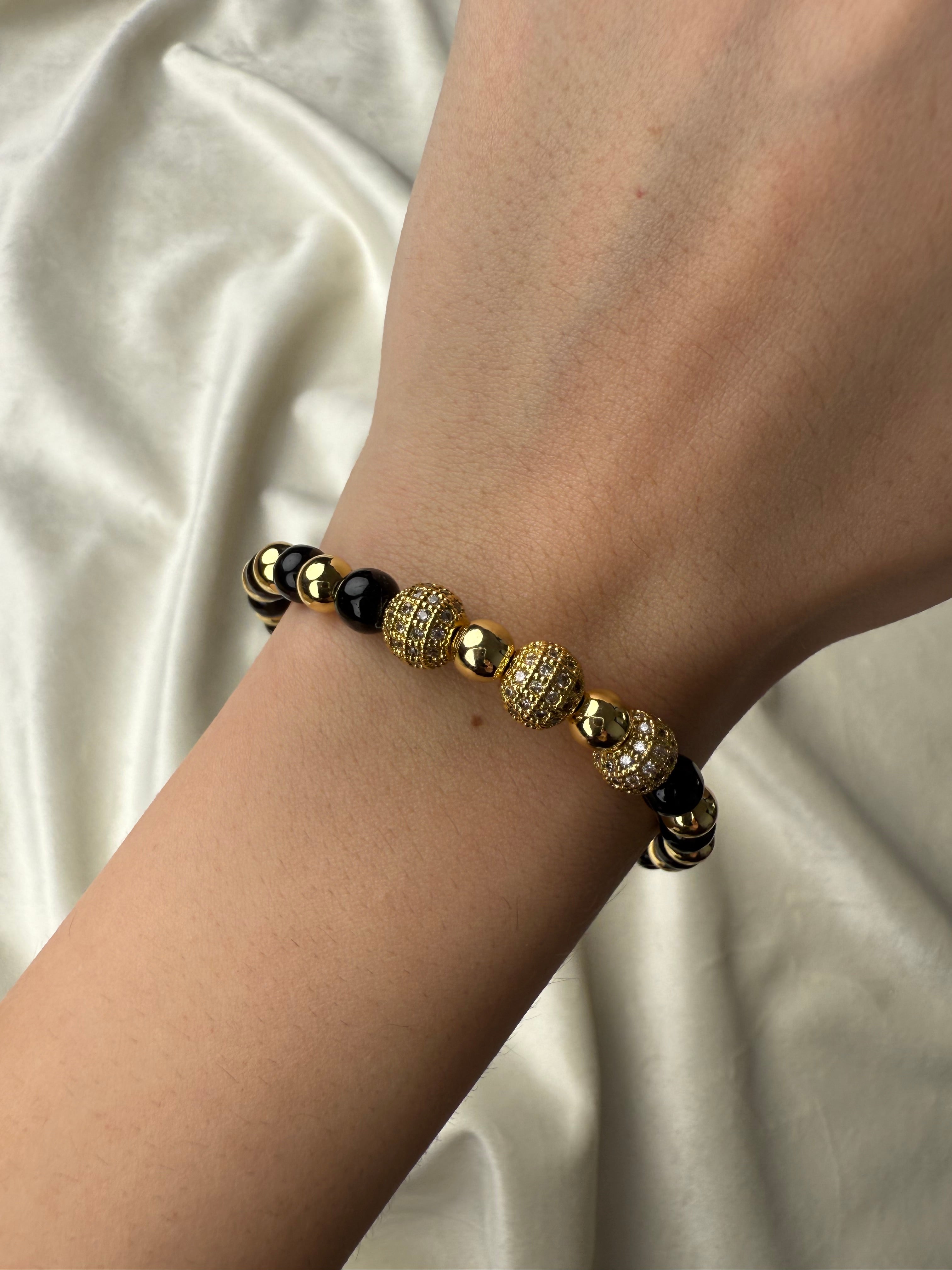 Byzylyk me gure te zinj dhe gold